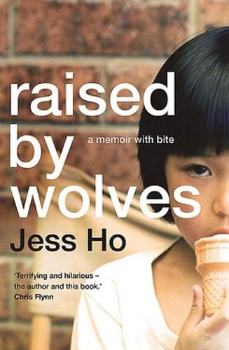 Cover image for Raised by Wolves: A Memoir with Bite